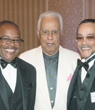 former Gov. L. Douglas Wilder, center, talks with the grandsons of an ODBA founder, Frederic Charles Carter Sr., at Saturday night’s banquet. They are Scott H. Carter, left, and Frederic Charles Carter III.