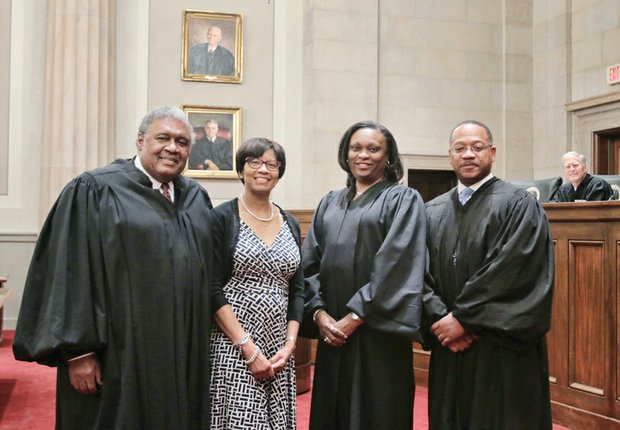 The Old Dominion Bar Association’s annual conference opened last Thursday with a special session of the Supreme Court of Virginia, where the African-American justices who have served on the state’s highest court were recognized. The honorees, left to right, retired Justice John Charles Thomas, Linda G. Hassell, widow of the late Chief Justice Leroy R. Hassell Sr., Justice Cleo E. Powell, and Justice S. Bernard Goodwyn.
