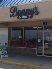 Bonny's Bistro, located in the same Larkin Avenue strip mall as Hobby Lobby and Burlington Coat Factory, could be mistaken for a restaurant were it not for a neon sign in the window and a sandwich board sign advertising slot machines and video poker set up outside.