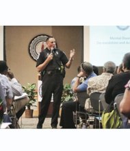 Richmond Police Officer Dean Waite talks about security to faith leaders Saturday at the Places of Worship Safety & Awareness Forum. About 200 people attended. Location: Richmond Police Academy next to the campus of Virginia Union University. 