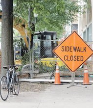 A portion of the sidewalk on the south side of Broad Street is closed to pedestrian and bicycle traffic as work progresses on the new Quirk Hotel. The development also will contain a new home for the Quirk Art Gallery. The 75-room luxury hotel is going into the nearly 100-year-old building at 201 W. Broad St. that originally was a department store. The gallery, now located a block west, is to fill 207 W. Broad St. The hotel-gallery is a project of Ted and Katie Ukrop. The hotel is projected to open in September. 