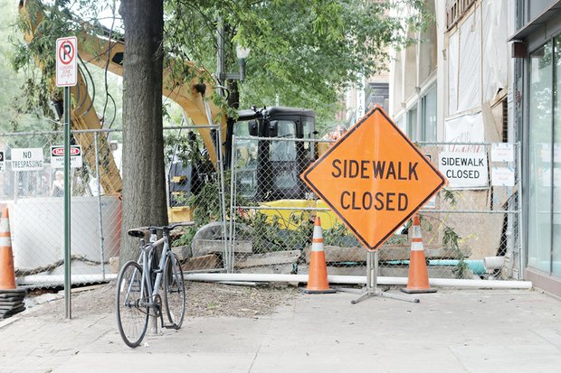 A portion of the sidewalk on the south side of Broad Street is closed to pedestrian and bicycle traffic as work progresses on the new Quirk Hotel. The development also will contain a new home for the Quirk Art Gallery. The 75-room luxury hotel is going into the nearly 100-year-old building at 201 W. Broad St. that originally was a department store. The gallery, now located a block west, is to fill 207 W. Broad St. The hotel-gallery is a project of Ted and Katie Ukrop. The hotel is projected to open in September. 