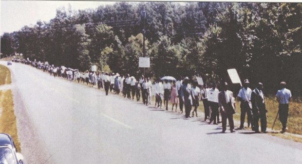 Members of the Virginia Students Civil Rights Committee participated in this voter registration march in August 1965 from First Baptist Church in Victoria to the Lunenburg County Courthouse. 