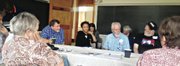 Alumni and guests of the Virginia Students Civil Rights Committee talk about their efforts in Southside Virginia at a 50th anniversary reunion last weekend in Blackstone. Facing the camera, from left, David Nolan, Janet Dewart Bell, Bruce Smith and Scott Marshall. 