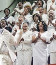 SINGING FOR A SAINT- The Greater Richmond Metro Mass Choir sings at the homegoing service for gospel music icon Maggie Ingram. Hundreds of people attended the service last Thursday at Saint Paul’s Baptist Church in Henrico County to celebrate the life of Mrs. Ingram, who for more than six decades led the family gospel group Maggie Ingram and the Ingramettes. 