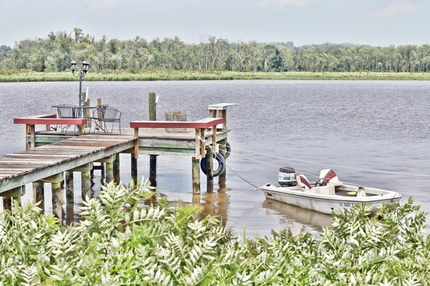 
The beauty and tranquility of the 1,200-acre Pamunkey reservation is captured on the banks of the Pamunkey River near the Pamunkey Fish Hatchery.