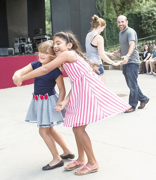 RHYTHM OF THE BEAT- 6-year-old Amilia Anderson and her 9-year-old sister, Vivien