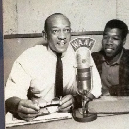 Elshabazz appears on Jesse Owens' radio show promoting his barbershop.