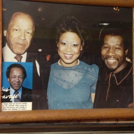 Elshabazz poses with the late Gus Savage and Savage's daughter, Emma.