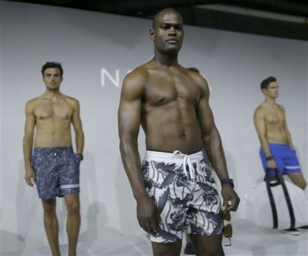 Models wear casual attire during the Nautica presentation at Men's Fashion Week in New York, Wednesday, July 15, 2015.