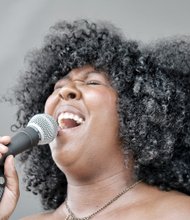 PAST, PRESENT COME TOGETHER AT HISTORY FESTIVAL - Richmond R&B singer Bri Luv performs to a rapt audience.