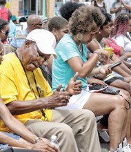 PAST, PRESENT COME TOGETHER AT HISTORY FESTIVAL- Hundreds of people turned out Saturday to celebrate a North Side neighborhood at the Brookland Park Boulevard History Festival. People enjoyed a plethora of entertainment, food and games at the event, which was held on the boulevard between North and Fendall avenues.