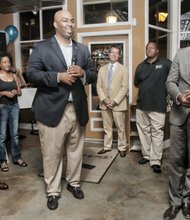 Lamont Bagby, the newest member of the House of Delegates, center, talks with supporters Tuesday night during his victory celebration at a Shockoe Bottom restaurant. They are, from left, Mayor Dwight C. Jones; restaurant owner Genet Semere; Grant Neely, the mayor’s chief of staff; the Rev. Tyrone E. Nelson of the Henrico County Board of Supervisors; and Levar Stoney, secretary of the commonwealth