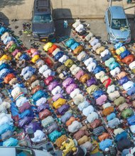 Worshipers in New York’s East Harlem neighborhood take part in the traditional prayer marking the end of Ramadan with the Eid al-Fitr holiday on July 17. Prayers took place outside the Masjid Aqsa-Salam mosque. 