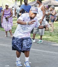 NORTH SIDE REUNION- William Berry, enjoying the music, shows off his dance moves.