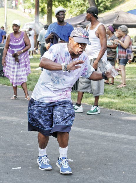 NORTH SIDE REUNION- William Berry, enjoying the music, shows off his dance moves.