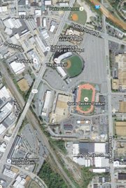 
Aerial view of the 61-acre, city-owned site on the Boulevard where advocates propose to build a children’s hospital. The Diamond baseball stadium, home to the Richmond Flying Squirrels and a prominent feature of the North Side property, is expected to be displaced regardless of the hospital plan outcome. This view was taken before the demolition of city buildings next to Sports Backers Stadium. 
