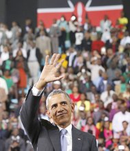 OBAMA IN AFRICA-
President Obama waves to a cheering crowd that packed an indoor stadium Sunday in Nairobi, Kenya, for the president’s visit. Kenya, the homeland of President Obama’s father, was the first stop on the president’s six-day journey through Africa, where he met with African heads of state and, on Monday, addressed the African Union in Addis Ababa, Ethiopia. In addition to seeking to further trade and cooperative arrangements between the United States and the African continent, the president addressed issues of human rights, women’s rights, ethnic conflict, corruption, terrorism, democracy, economic growth and presidential term limits. While in Kenya, he met with his extended family members. He is the first sitting U.S. president to visit Kenya or Ethiopia.