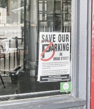 
Business owners and residents along Broad Street and the Fan are posting signs protesting the loss of parking spaces on Broad Street because of GRTC’s planned bus rapid transit.