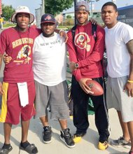 Longtime friends, left to right, TreVon Cannon, Keshaun Smoot, Marquis Richardson and Daryl Johnson were the first fans into the Washington professional football team’s training camp for three years running.