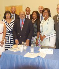 Business owners gathered during a Chatham Business Association (CBA) monthly membership meeting on August 11, 2015 and discussed a proposed medical marijuana plant slated to open in Chicago’s Chatham neighborhood.
L-R Sue Simon Taylor, Illinois Grown Medicine; Desiree Tate, Illinois Grown Medicine; Edie Moore, Illinois Grown Medicine; Melinda Kelly, Exec. Dir., CBA; Marino Orlandi, CBA; William Garth, Sr., CEO, Chicago Citizen Newspaper; London Rakestraw, SCR Transportation, Inc.; Dr. Niva Lubin-Johnson, Les Hollis, CEO, Illinois Grown Medicine; Ald. Michelle Harris (8th Ward), Andrew DeAngelo, Illinois Grown Medicine; Don Bransford; Donnie Brown, CBA and Gwendolyn Shaw, CBA.