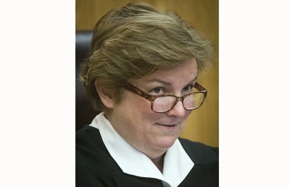 Can Justice Jane Marum Roush legally serve? That question now hangs over the latest addition to the Virginia Supreme Court. ...