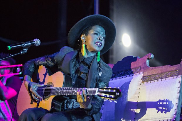 Richmond Jazz Festival brings the music to Maymont- Singer-songwriter Lauryn Hill demonstrates her range as she plays the guitar.