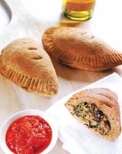 Calzones provide a fun and tasty alternative to pizza. Home cooks who want to think outside the pizza box. Calzones provide a fun and tasty alternative to pizza. Home cooks who want to think outside the pizza box.