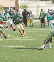 
Huguenot Falcons work on offense and defense as they prepare to welcome Thomas Jefferson for the first home game on their new field Saturday.