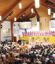 The pews and the choir loft are full for a July service at Alfred Street Baptist Church in Alexandria.