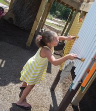 Fun at ARCpark- Serenity Sommerville, 7, plays tube bells.