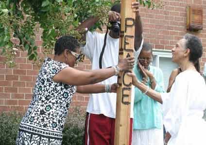 Lenett Nef'fahtiti Partlow-Myrick read an article that was written by the Rev. Bernette Jones, Senior Minister of One God One ... Lenett Nef'fahtiti Partlow-Myrick read an article that was written by the Rev. Bernette Jones, Senior Minister of One God One ...