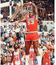 
Darryl Dawkins, aka “Chocolate Thunder,” slams home a dunk for the Philadelphia 76ers in a 1980 game against the New Jersey Nets.