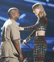 Kanye West and Taylor Swift — together again — as she welcomes him to the stage.