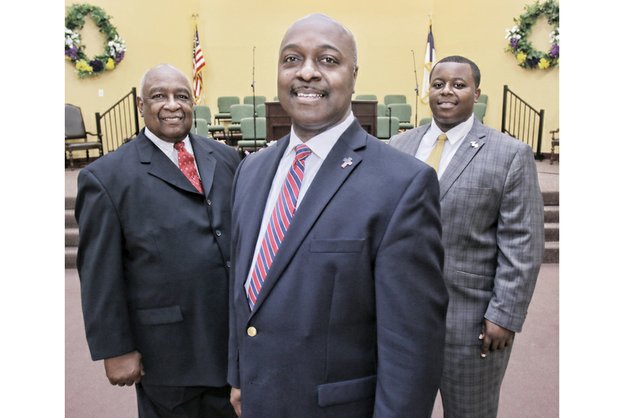 

Three generations of the Stinson family serve as church leaders at Southside Baptist Ministries. From left, they are Dr. Lonnie Stinson, senior pastor; his son, Assistant Pastor Reginald Stinson; and grandson, LeVon Stinson, a coach and choir member.