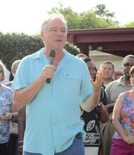 Party with Politics-The event drew nearly 1,000 people, including more than 50 politicians from around the state. Many already hold elected office and are seeking re-election, while others are running for seats ranging from the Virginia House of Delegates to county sheriff and school board. At left, U.S. Sen. Tim Kaine, pumps up the crowd, with his wife, state Secretary of Education Anne Holton, looking on. 