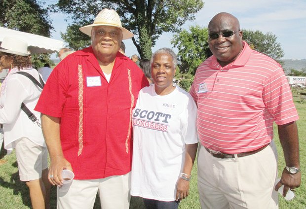 Party with Politics- Also enjoying the event are Norfolk State University President Eddie N. Moore and event volunteer Cheryl Ivey Green, executive assistant to Richmond Mayor Dwight C. Jones. 