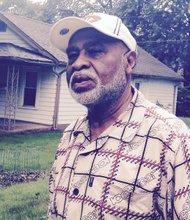 William Sykes said he was shocked to learn about four bodies found at his neighbor's garage on the 13900 block of South Dearborn in Riverdale, Ill. 