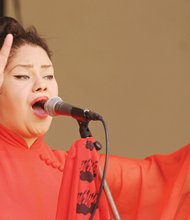 Virginia PrideFest // Buttafly Vazquez of The Hy-Steps performs at Brown’s Island during the annual festival that celebrates Virginia’s gay, lesbian, bisexual and transgender community. 