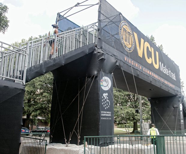 This bridge allows pedes- trians to cross West Main Street during the upcoming bike races.
Location: Between Cherry and Harrison streets on the Virginia Commonwealth University campus. This is one of two temporary bridges VCU has set up along the route of the world cycling competition. The other is at West Franklin and Shafer streets.