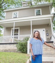 Gwendolyn H. MacClenahan stands in front of the Highland Park house she planned to turn into a group home where women released from prison could begin to rebuild their lives. Location: 2414 4th Ave.