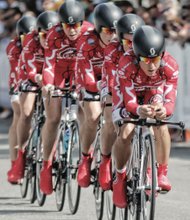 Racers from USA-based Team Pepper Palace Pro tightly wind along Lakeside Avenue in Henrico County on Sunday after the start of the Women’s Elite Team Time Trial.