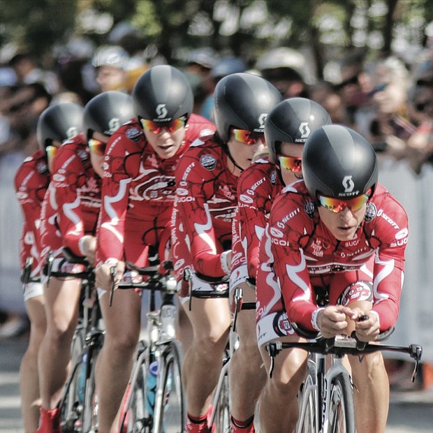 Racers from USA-based Team Pepper Palace Pro tightly wind along Lakeside Avenue in Henrico County on Sunday after the start of the Women’s Elite Team Time Trial.