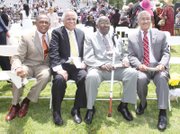 VIPs surround Dr. Allix B. James, third from left, at Virginia Union University’s 2012 Commencement. Seated with him at Hovey Field are, from left, Richmond Mayor Dwight C. Jones, a VUU alumnus; Raymond H. Boone, the late Free Press founder, editor and publisher; and U.S. Rep. Robert C. “Bobby” Scott.