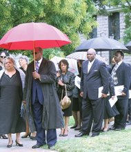 Dr. James’ daughter, Portia James-Stubbs, leads family and close friends into the service, including Dr. James’ goddaughter, former Richmond Circuit Court Judge Margaret P. Spencer and husband U.S. District Court Judge James R. Spencer, center. 