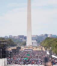 Million Man March 20 years later -
Throngs of people from across the nation flooded the National Mall in Washington for the Justice Or Else rally marking the 20th anniversary of the Million Man March. People of all ages, ethnicities, faiths and backgrounds were drawn to the capital for the event initiated by Nation of Islam leader Minister Louis Farrakhan. A number of speakers and activists addressed participants, calling for changes in the conditions that oppress African-Americans and other marginalized people. Coverage, B3.
By Jeremy M. Lazarus
Charlene C. Harris hoped to live out her years at 1600 Colorado Ave., the single- family brick cottage that she and her family have called home for 47 years.
But now the retired 68-year- old state employee is being told she must either purchase the two-bedroom home from her landlord, the Richmond Redevelopment and Housing Authority, or face moving.
“It’s a terrible situation,” she said. “RRHA has told me I have to put up $500 to begin the process and to get a mortgage by December. Otherwise, I would have to accept relocation.”
Like other public housing tenants of such homes, she feels caught in a Catch-22. Until she puts up the $500, RRHA won’t provide an appraisal that would let her know what the sales price would be so she could figure out if she could afford
Sandra Sellars/Richmond Free Press
Charlene C. Harris stands in front of her two-bedroom home in the West End. She has been told to buy it or face having to move. Location: 1600 Colorado Ave.
RRHA residents in ‘buy or move’ spot
the house on her fixed income of about $1,500 a month.
It is an ironic twist that RRHA is now marking its 75th