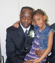 Daddy's Home// Former Richmond Justice Center inmate Aziz Scott gained celebrity status this week when he was featured on two national television shows. He is pictured above with his 8-year-old daughter, De’Andra, at the 8th Annual Date with Dad Dinner and Dance at the city jail in March. He and his daughter were shown at the dance, organized by Richmond-based CAMP DIVA, on CNN’s “This Is Life With Lisa Ling” Wednesday and on the “Steve Harvey” talk show Tuesday. The shows described Mr. Scott’s participation in the jail’s REAL program, which stands for Recovering from Everyday Addictive Lifestyles. Mr. Scott, 53, credits his participation in the program for helping him turn his life around. He was released from jail in August after serving 17 months for selling drugs. Assisting in efforts to help Mr. Scott succeed, Mr. Harvey presented him with a $5,000 check to relocate his family to a safer neighborhood.
