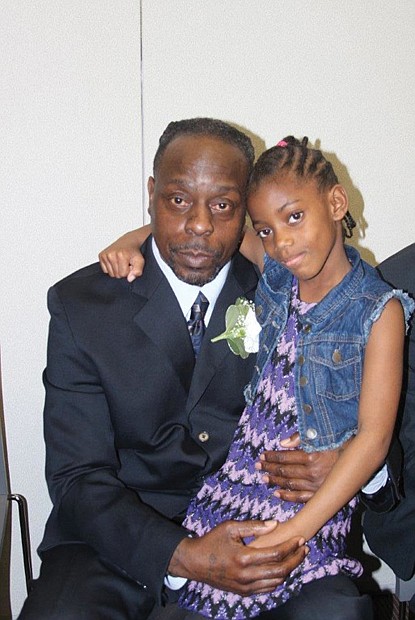 Daddy's Home// Former Richmond Justice Center inmate Aziz Scott gained celebrity status this week when he was featured on two national television shows. He is pictured above with his 8-year-old daughter, De’Andra, at the 8th Annual Date with Dad Dinner and Dance at the city jail in March. He and his daughter were shown at the dance, organized by Richmond-based CAMP DIVA, on CNN’s “This Is Life With Lisa Ling” Wednesday and on the “Steve Harvey” talk show Tuesday. The shows described Mr. Scott’s participation in the jail’s REAL program, which stands for Recovering from Everyday Addictive Lifestyles. Mr. Scott, 53, credits his participation in the program for helping him turn his life around. He was released from jail in August after serving 17 months for selling drugs. Assisting in efforts to help Mr. Scott succeed, Mr. Harvey presented him with a $5,000 check to relocate his family to a safer neighborhood.
