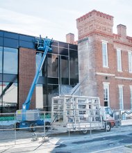 
The historic Leigh Street Armory now sports a new addition as it moves closer to its opening next year as the new home of the Black History Museum and Cultural Center of Virginia. Part of the armory’s $8.5 million overhaul, the new addition is to feature offices and expanded space for exhibits and community events. Dating to 1895, the unique castle-shaped building originally was the headquarters for African- American militia units and served as a recreation center for soldiers during World War II. Location: Leigh and St. Peter streets in Jackson Ward.