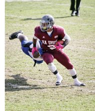 Virginia Union University running back Hakeem Holland breaks free of a Chowan University defender last Saturday during the Panthers’ 33-14 homecoming win at Hovey Field